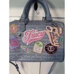 Juicy Couture Blue Run the World Satchell NWOT. Never used, missing tag.